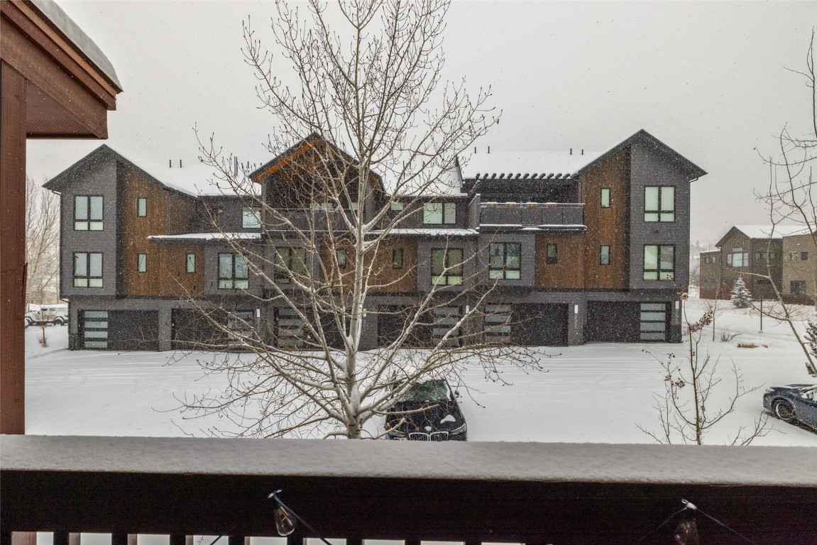 2545 Cattle Kate Circle, Unit 3207 Steamboat Springs, CO 80487 - Photo 41 of 42 a view of a house with snow on the road