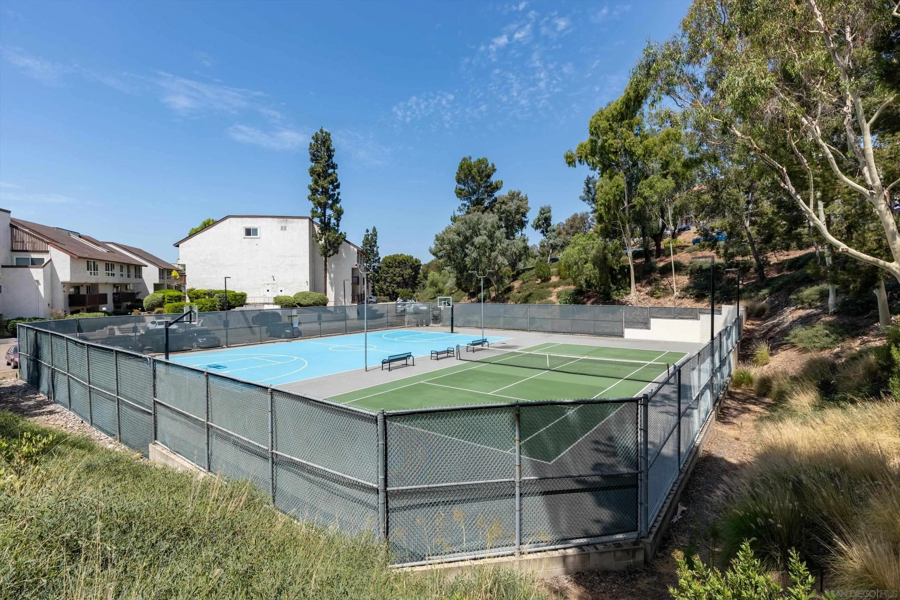 6111 Rancho Mission Road, Unit 313 San Diego, CA 92108 - Photo 23 of 25 a view of a swimming pool with a patio