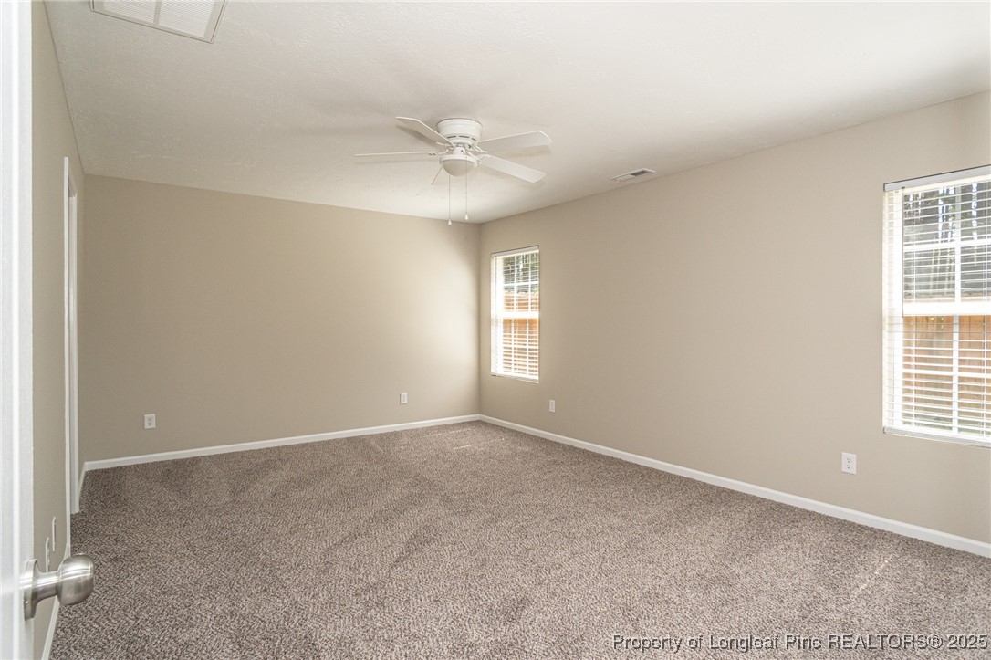 2830 John McMillan Road Hope Mills, NC 28348 - Photo 22 of 46 a view of an empty room with a window