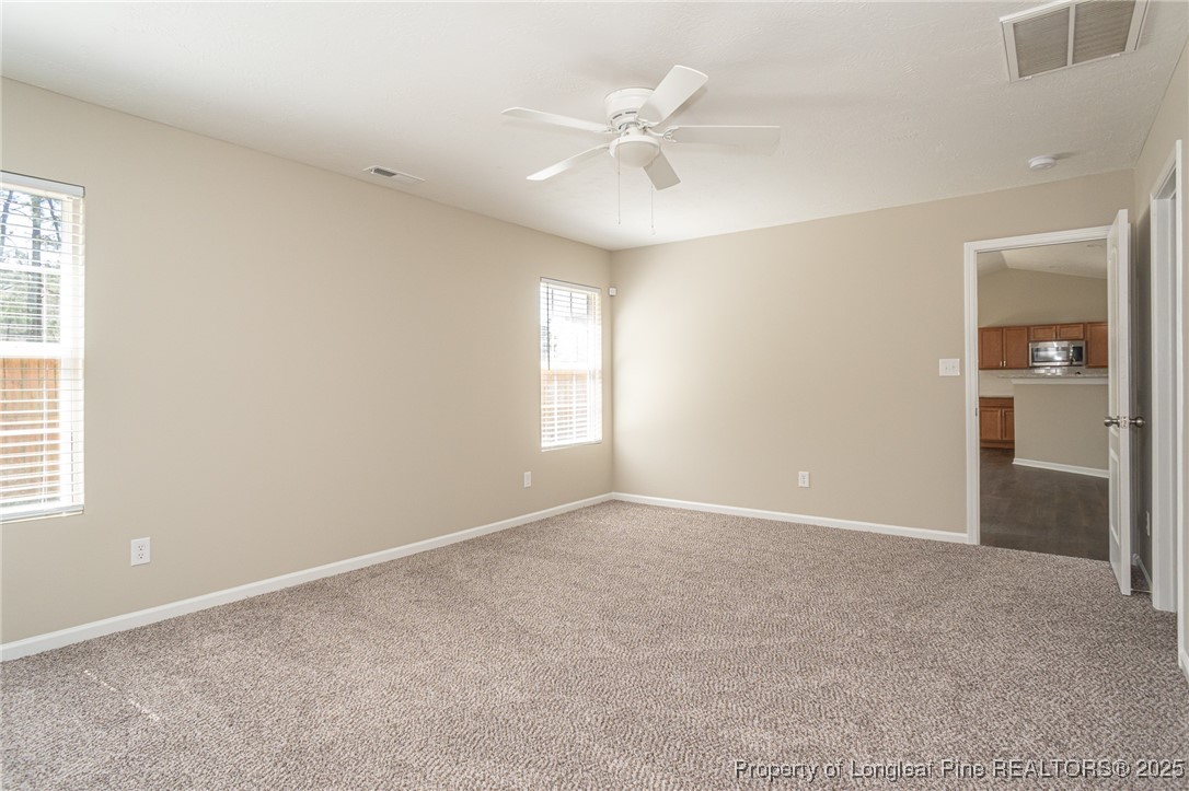 2830 John McMillan Road Hope Mills, NC 28348 - Photo 28 of 46 an empty room with windows and closet