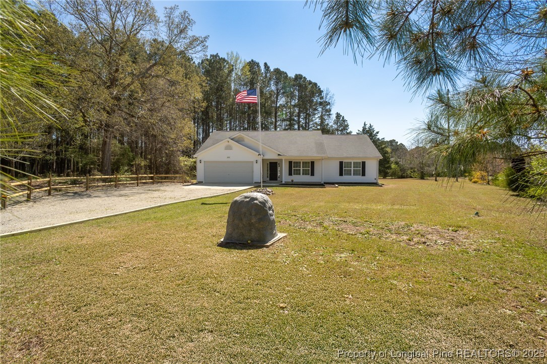 2830 John McMillan Road Hope Mills, NC 28348 - Photo 44 of 46 a view of a house with swimming pool and sitting area