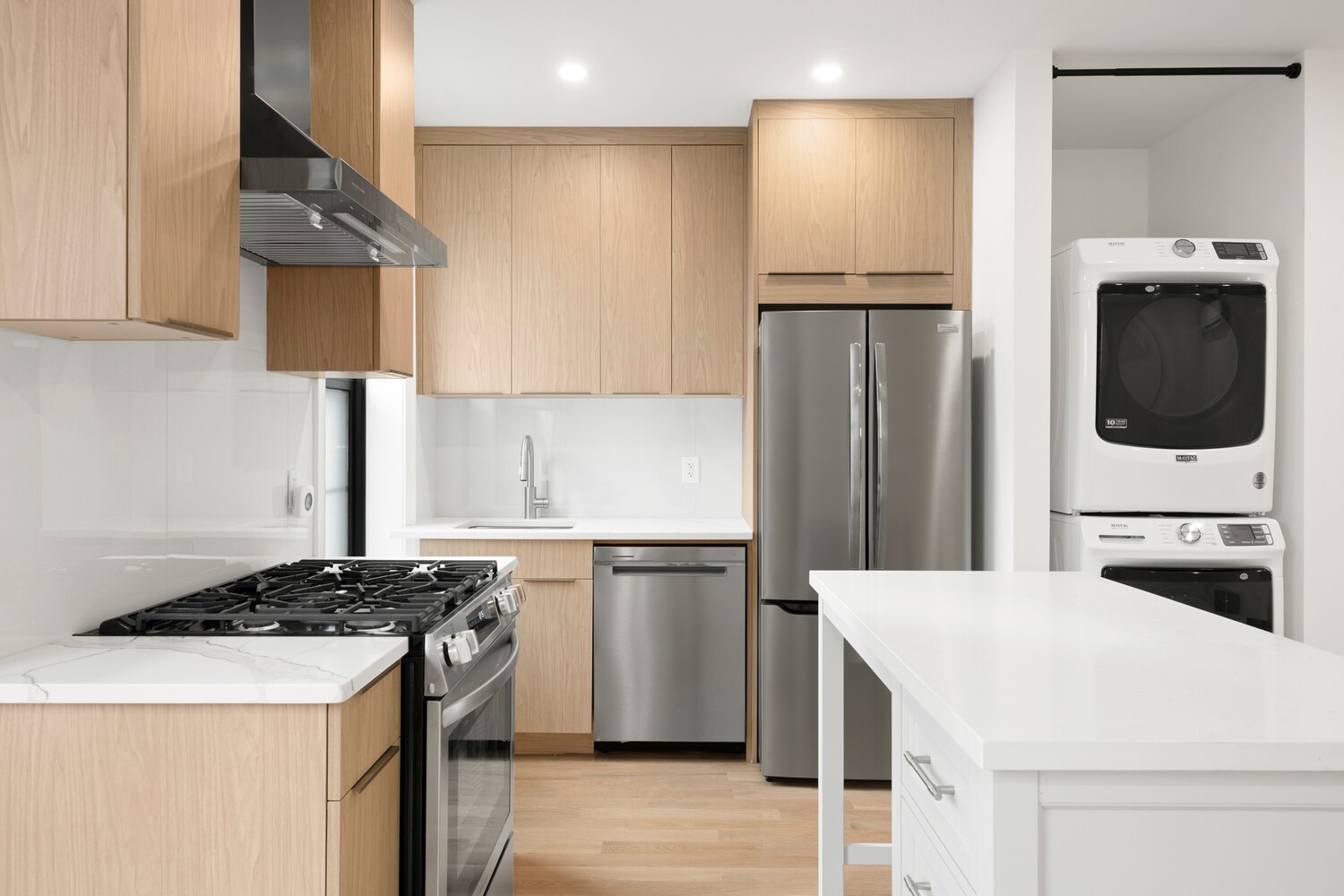 422 4th Avenue, Unit 3 Brooklyn, NY 11215 - Photo 10 of 11 a kitchen with a sink a stove and refrigerator