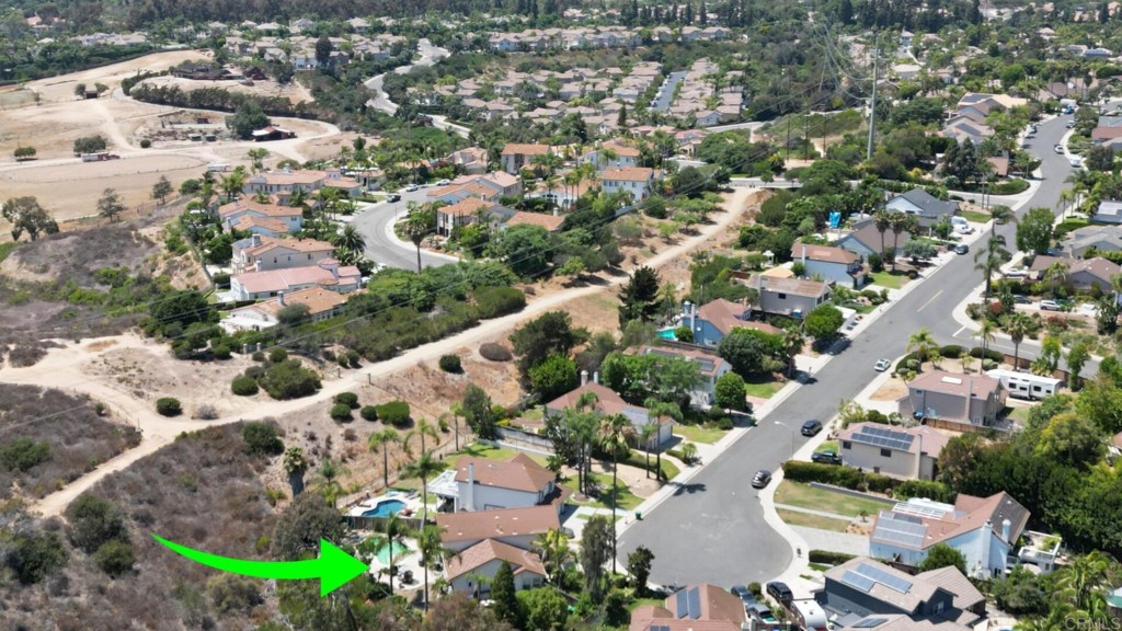 7259 Mimosa Drive Carlsbad, CA 92011 - Photo 13 of 19 an aerial view of residential houses with outdoor space