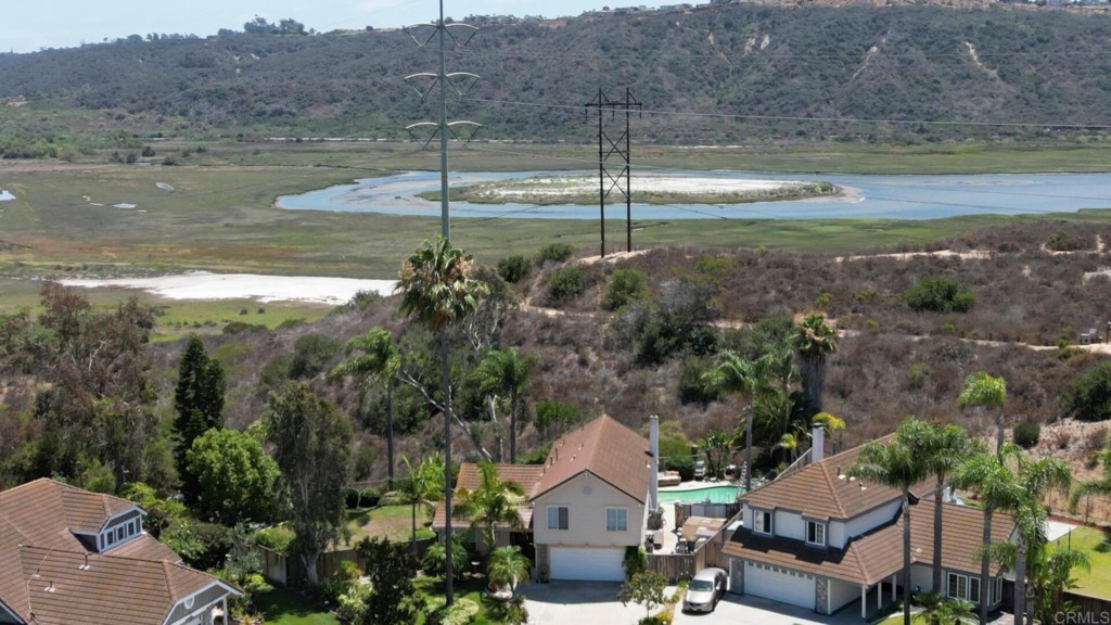7259 Mimosa Drive Carlsbad, CA 92011 - Photo 4 of 19 a view of a town with mountains in the background