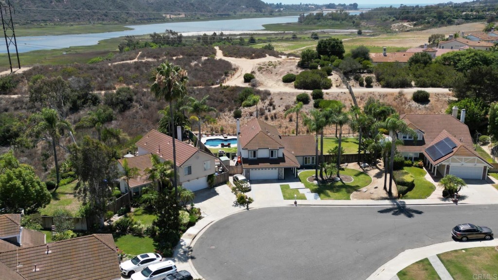 7259 Mimosa Drive Carlsbad, CA 92011 - Photo 5 of 19 an aerial view of a house with a lake view