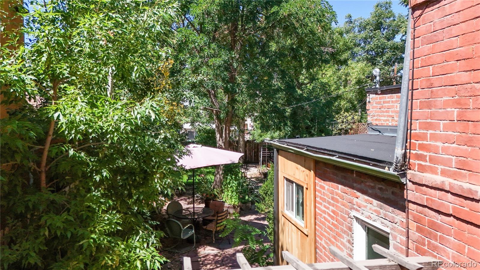 2733 Humboldt Street Denver, CO 80205 - Photo 27 of 40 a view of a chairs and table in the patio