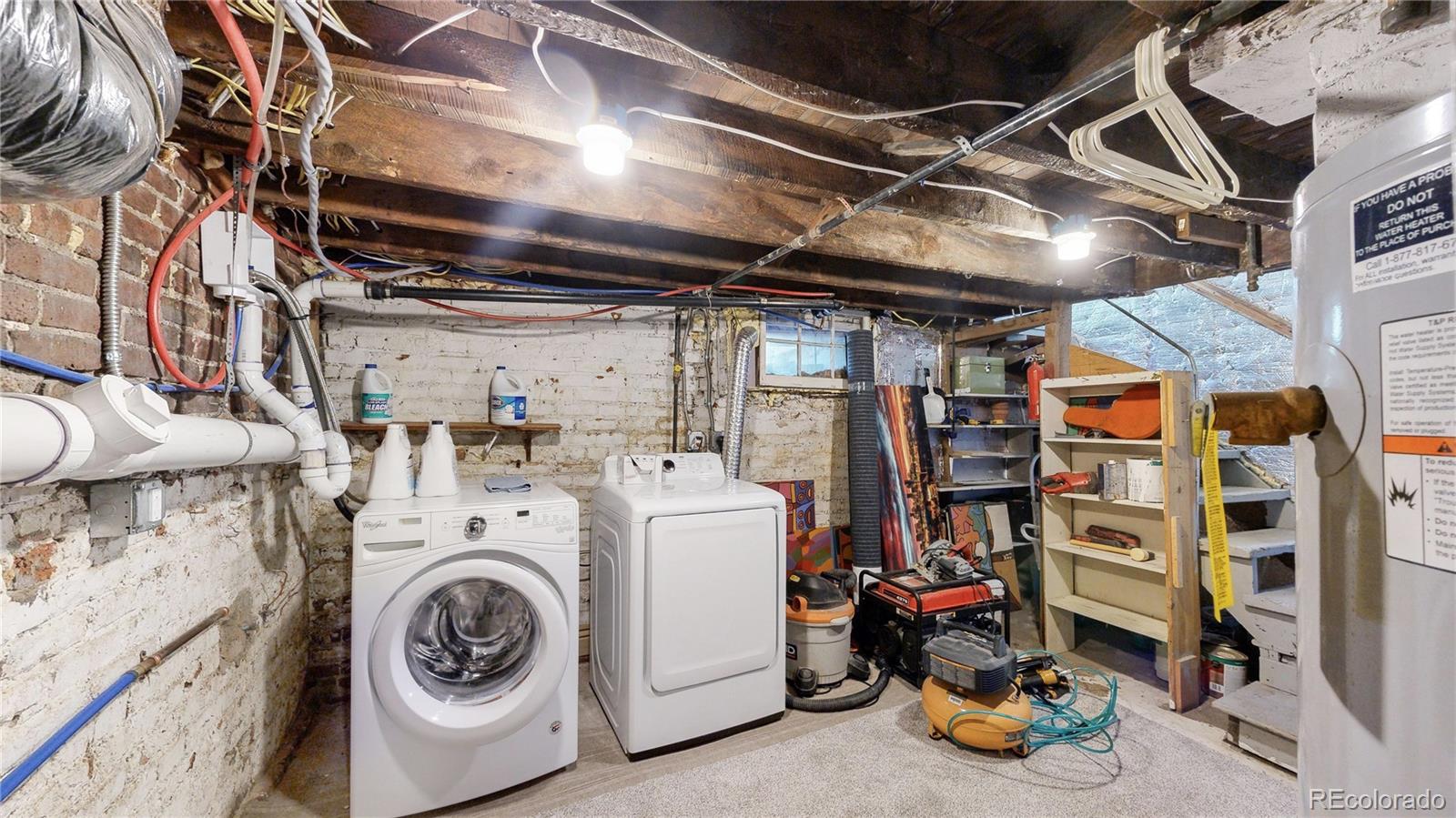 2733 Humboldt Street Denver, CO 80205 - Photo 30 of 40 a utility room with dryer and washer