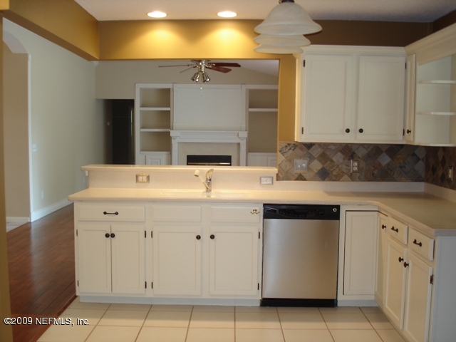 600 Roberts Road Fruit Cove, FL 32259 - Photo 5 of 9 a bathroom with a sink vanity and a mirror