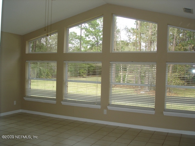 600 Roberts Road Fruit Cove, FL 32259 - Photo 7 of 9 a view of an empty room with a window