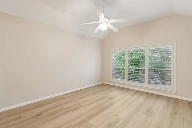 a bathroom with a sink double vanity and a mirror
