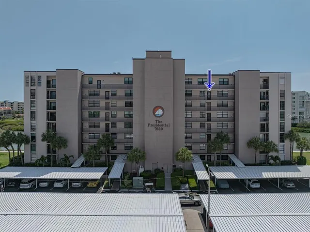 a front view of a building with glass windows
