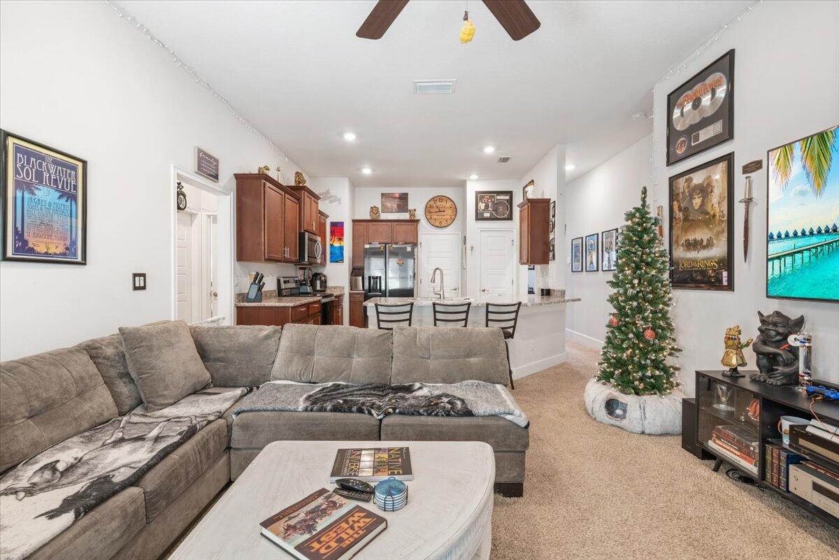 5348 Vespera Street Fort Pierce, FL 34951 - Photo 11 of 39 a living room with furniture and a large window