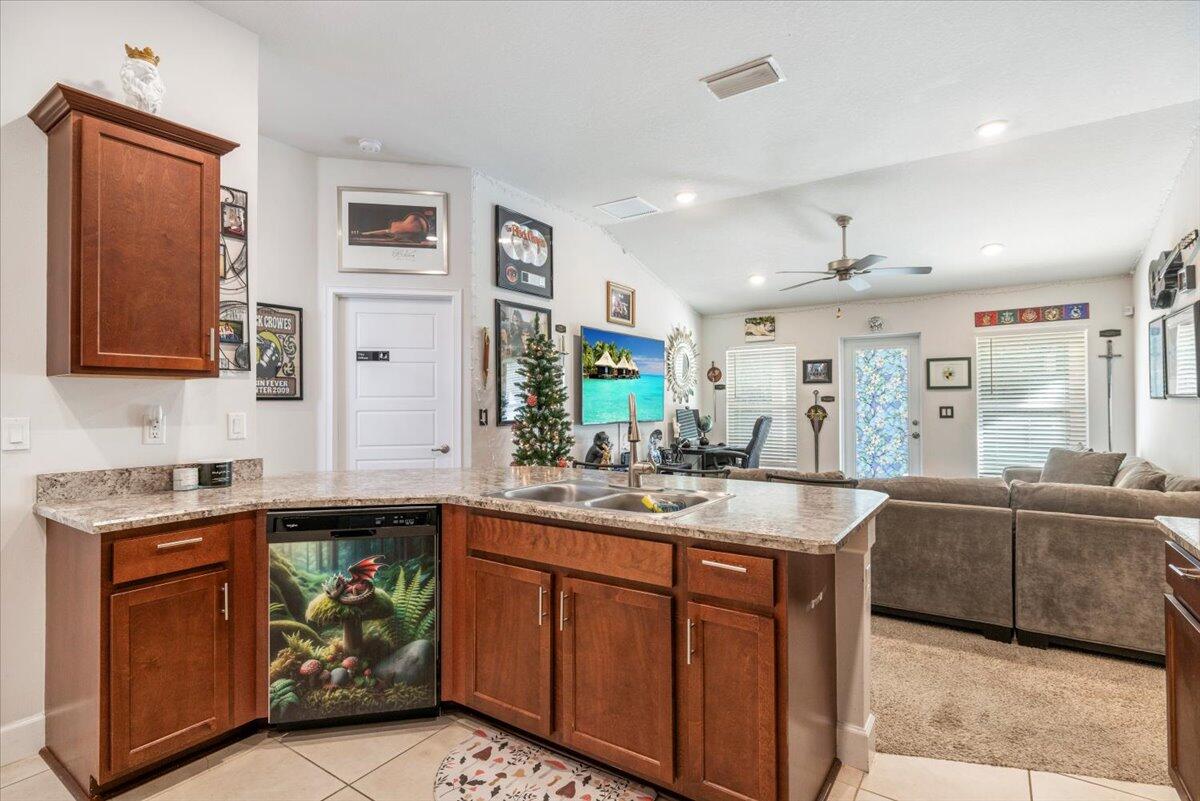 5348 Vespera Street Fort Pierce, FL 34951 - Photo 17 of 39 a kitchen with a stove and a sink