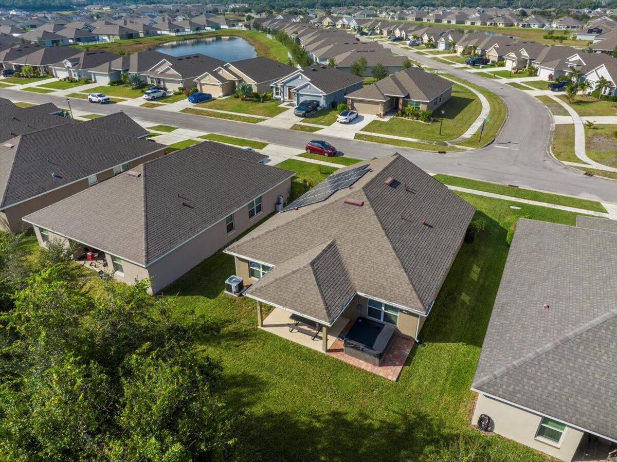 5348 Vespera Street Fort Pierce, FL 34951 - Photo 31 of 39 an aerial view of residential houses with yard