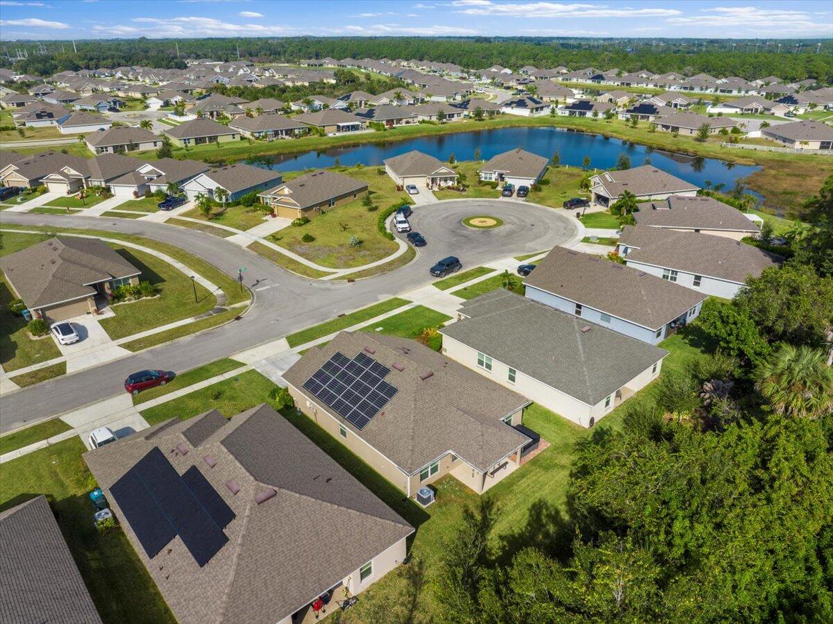 5348 Vespera Street Fort Pierce, FL 34951 - Photo 33 of 39 an aerial view of a house with a ocean view