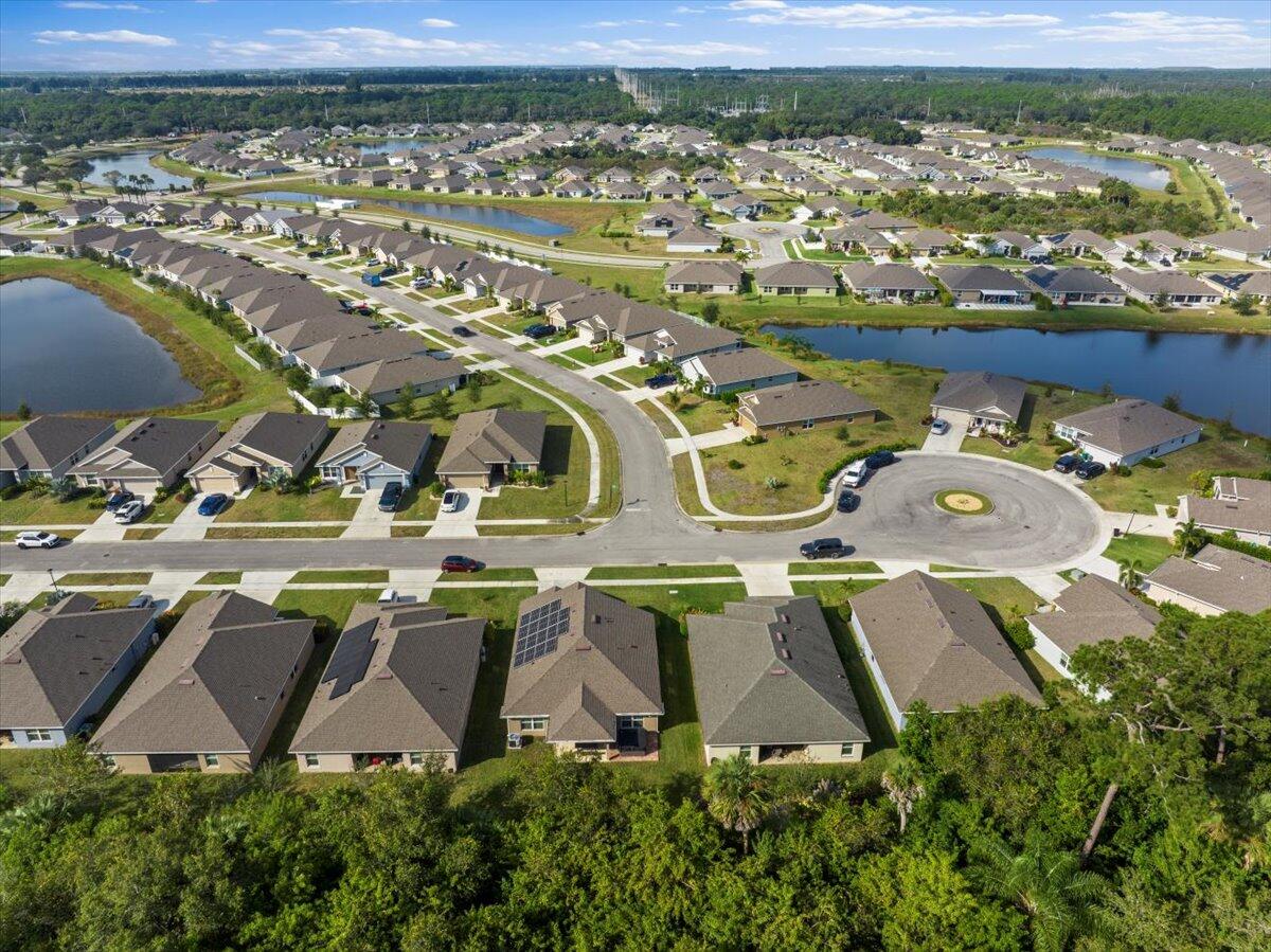 5348 Vespera Street Fort Pierce, FL 34951 - Photo 38 of 39 an aerial view of a house with a ocean view