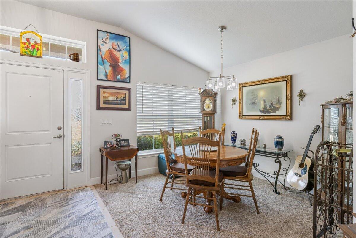 5348 Vespera Street Fort Pierce, FL 34951 - Photo 4 of 39 a dining room with furniture and window