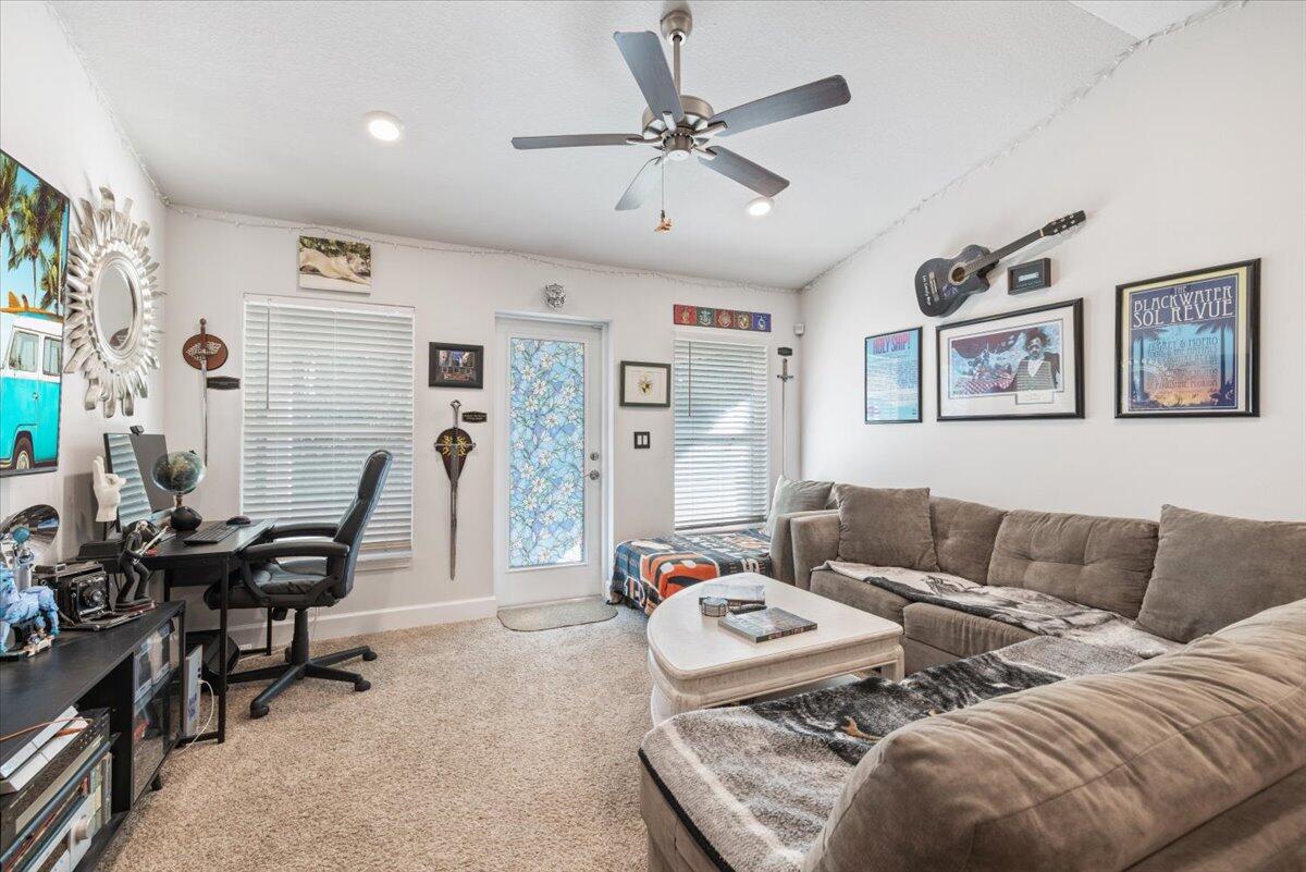 5348 Vespera Street Fort Pierce, FL 34951 - Photo 8 of 39 a living room with furniture and wooden floor