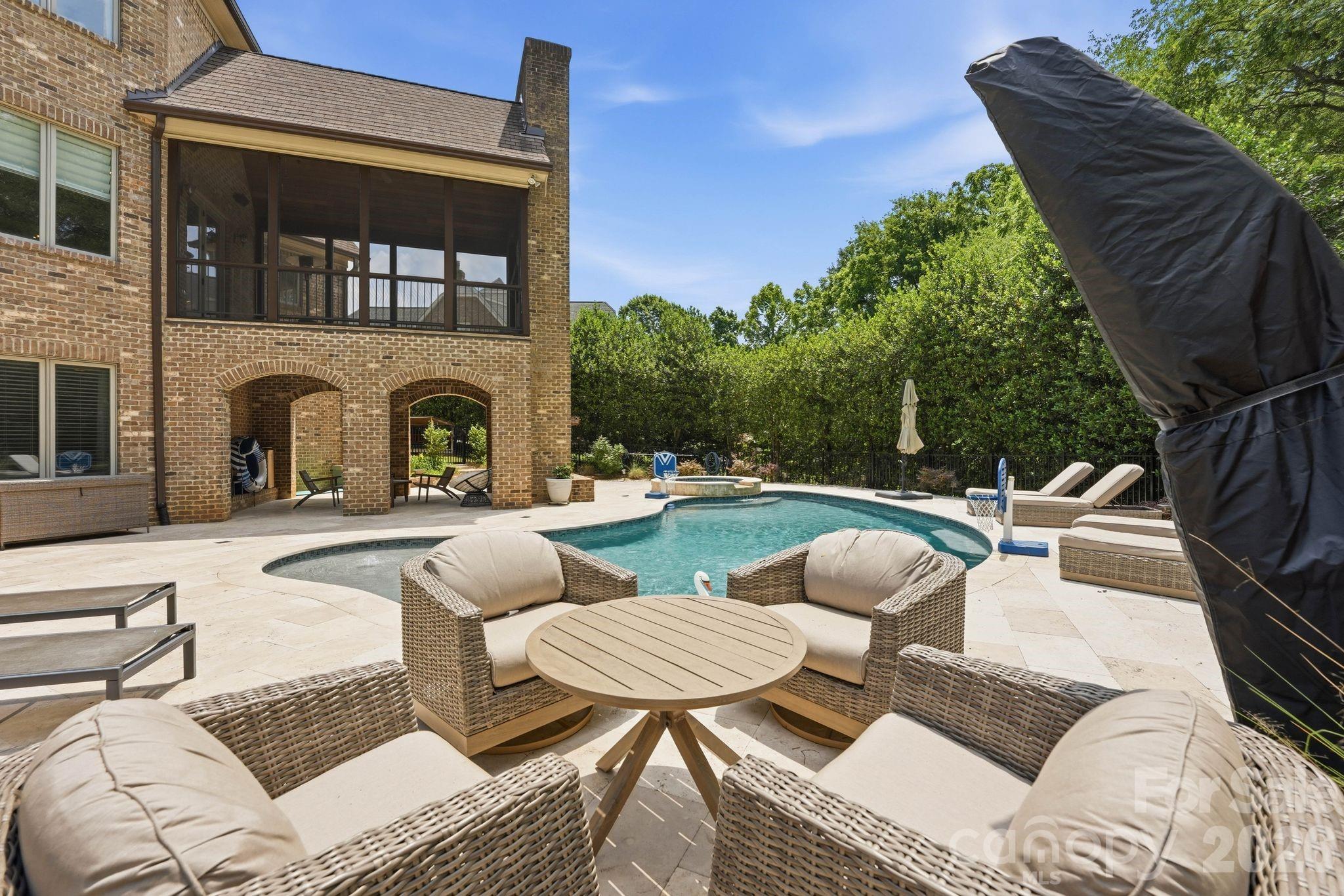 7416 Lee Rea Road Charlotte, NC 28226 - Photo 9 of 48 a view of a patio with couches chairs and a table