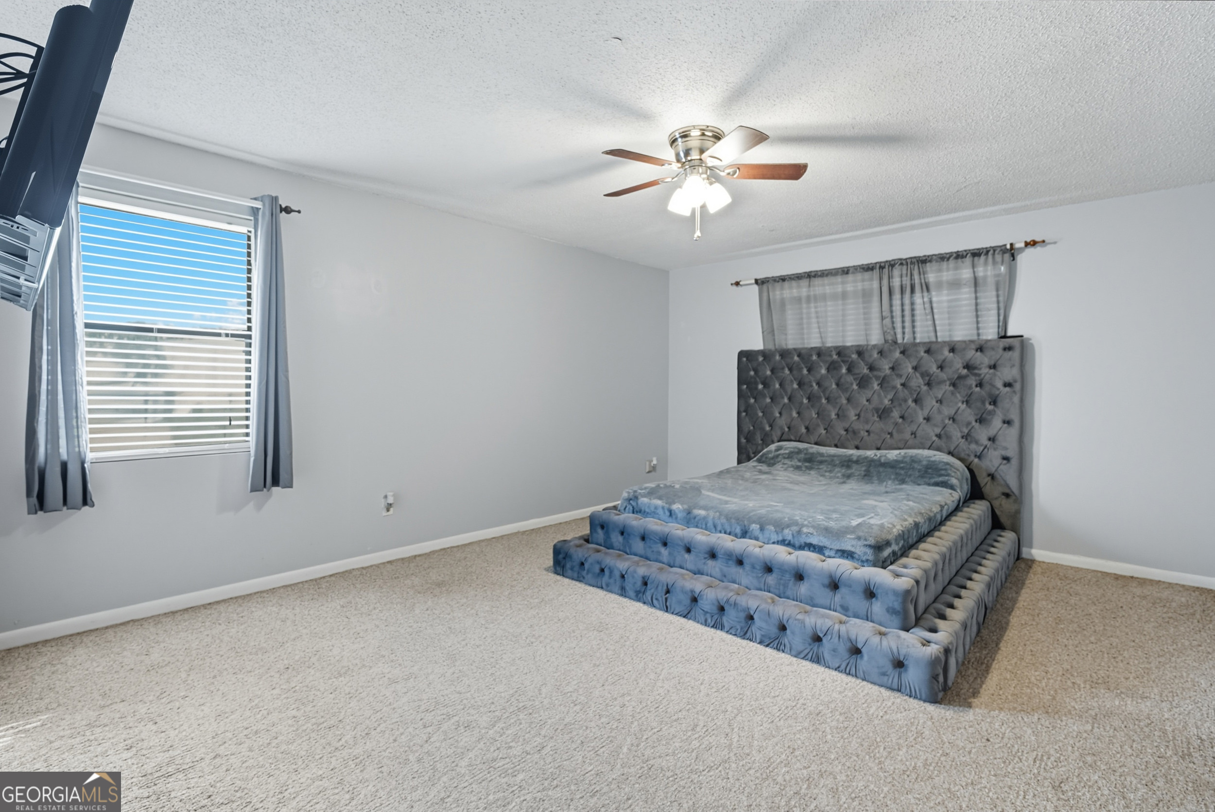 757 Old Screven Road Jesup, GA 31545 - Photo 14 of 38 a bedroom with a bed and window