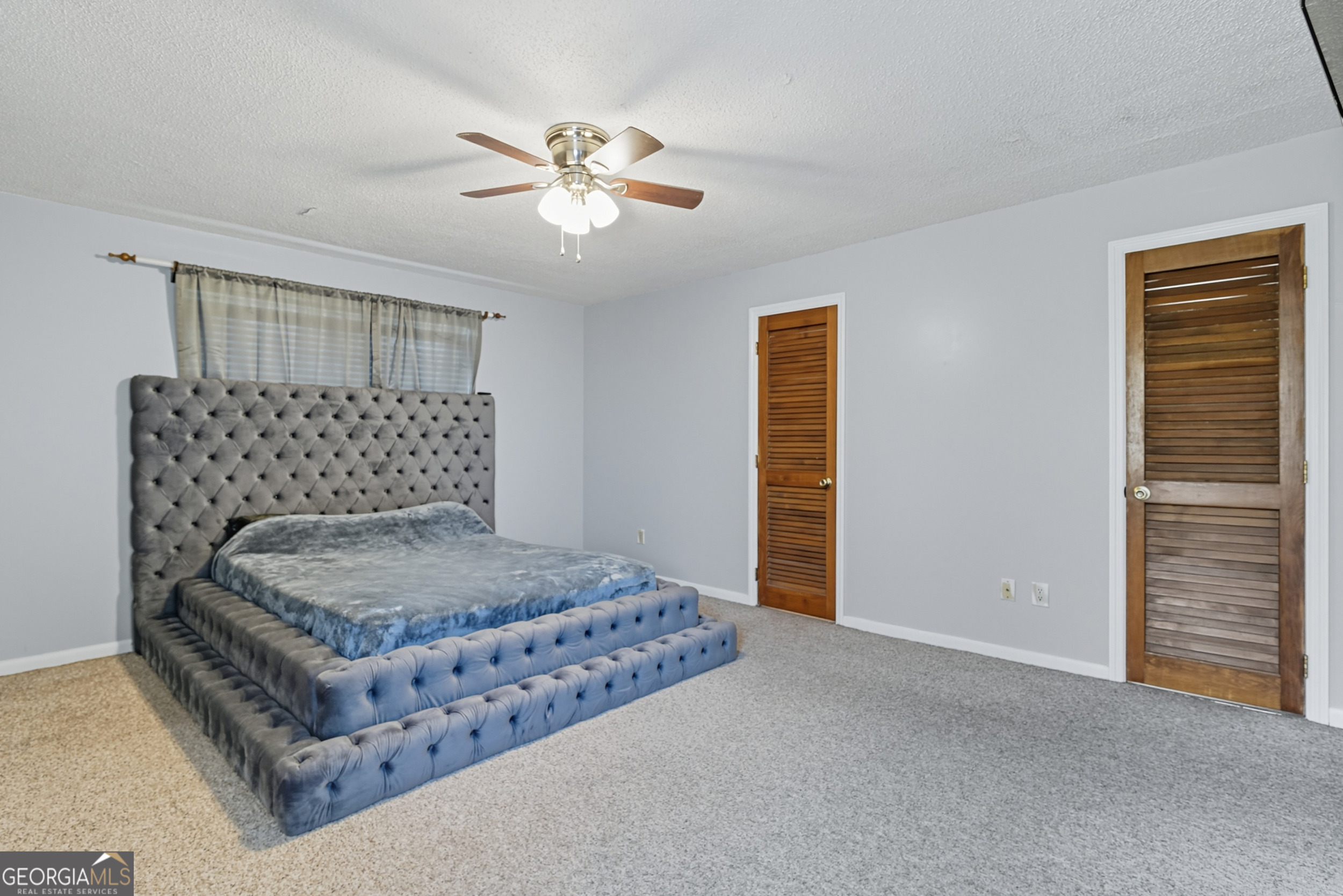 757 Old Screven Road Jesup, GA 31545 - Photo 15 of 38 a bedroom with a bed and window