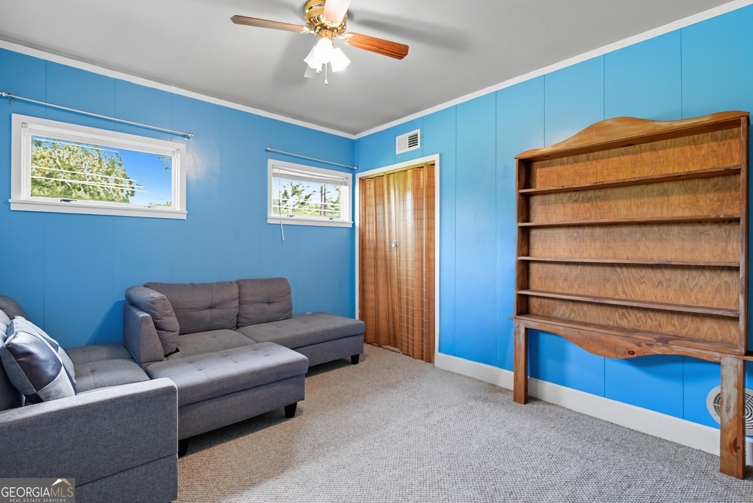 757 Old Screven Road Jesup, GA 31545 - Photo 23 of 38 a living room with furniture and a window