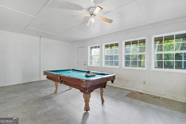 a view of a backyard with wooden floor and a backyard