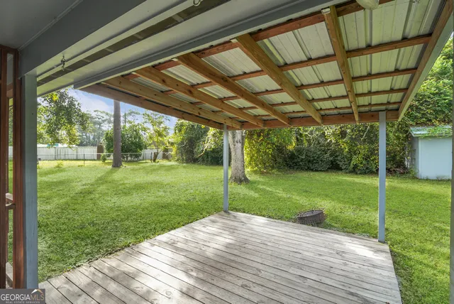 a view of a house with a garden