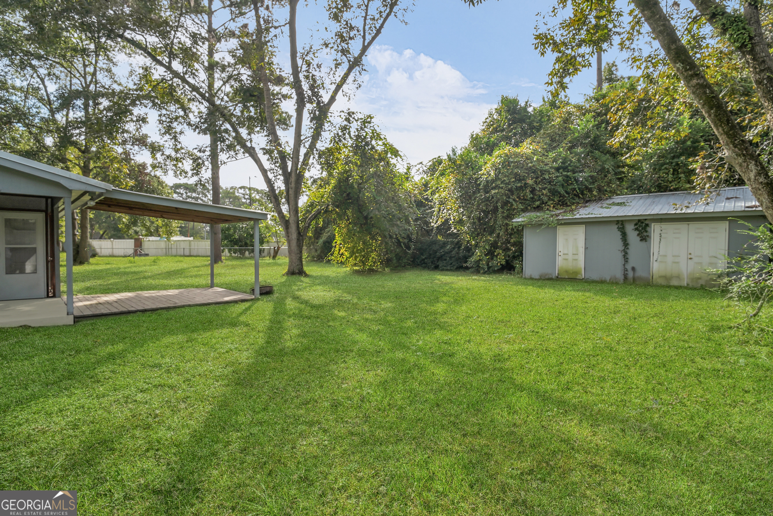 757 Old Screven Road Jesup, GA 31545 - Photo 37 of 38 a view of a house with a yard