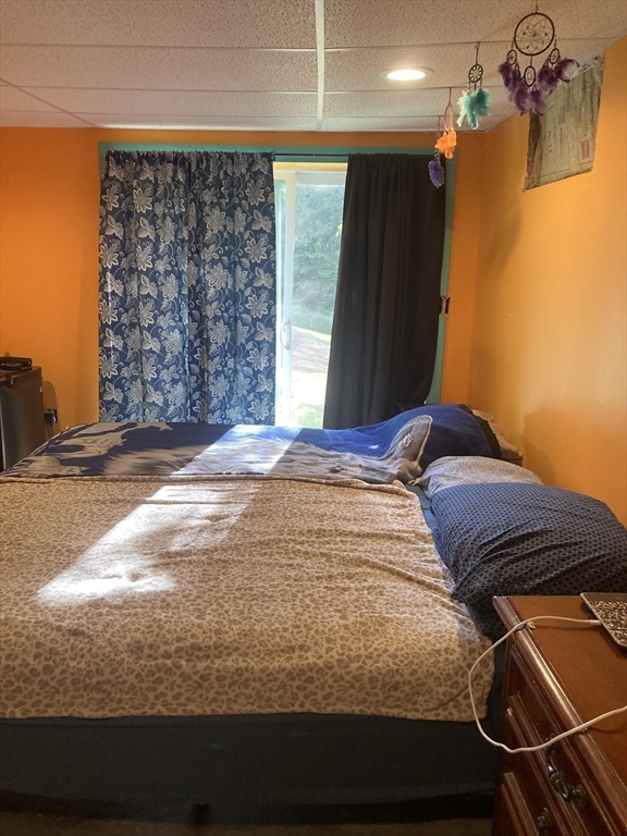 6 Kimball Hill Road Holland, MA 01521 - Photo 16 of 19 a bedroom with a bed and a window