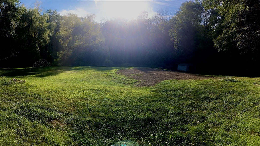 6 Kimball Hill Road Holland, MA 01521 - Photo 19 of 19 a backyard of a house with lots of green space