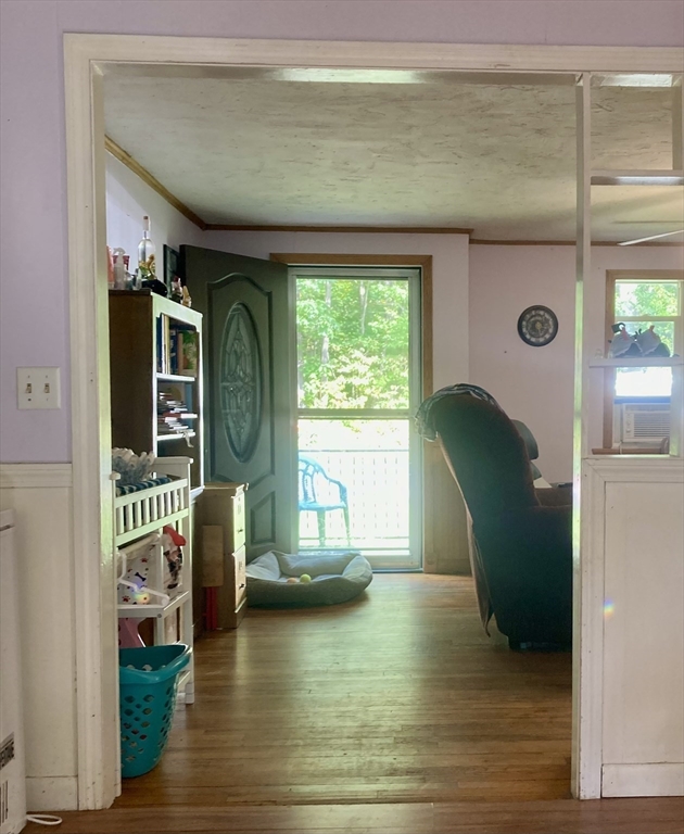 6 Kimball Hill Road Holland, MA 01521 - Photo 8 of 19 a living room with furniture and a window