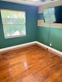 6075 Adriatic Way Greenacres, FL 33413 - Photo 20 of 24 a view of a room with a large window