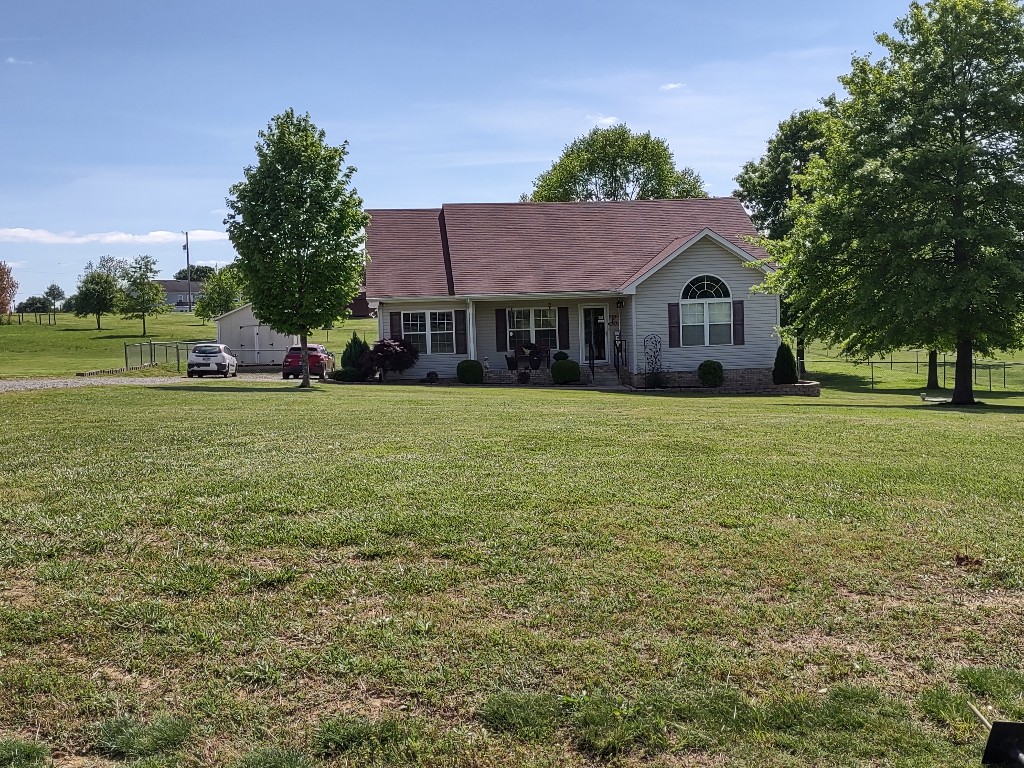 505 Martin Chapel Road Portland, TN 37148 - Photo 2 of 35 a view of a house with a big yard and large trees