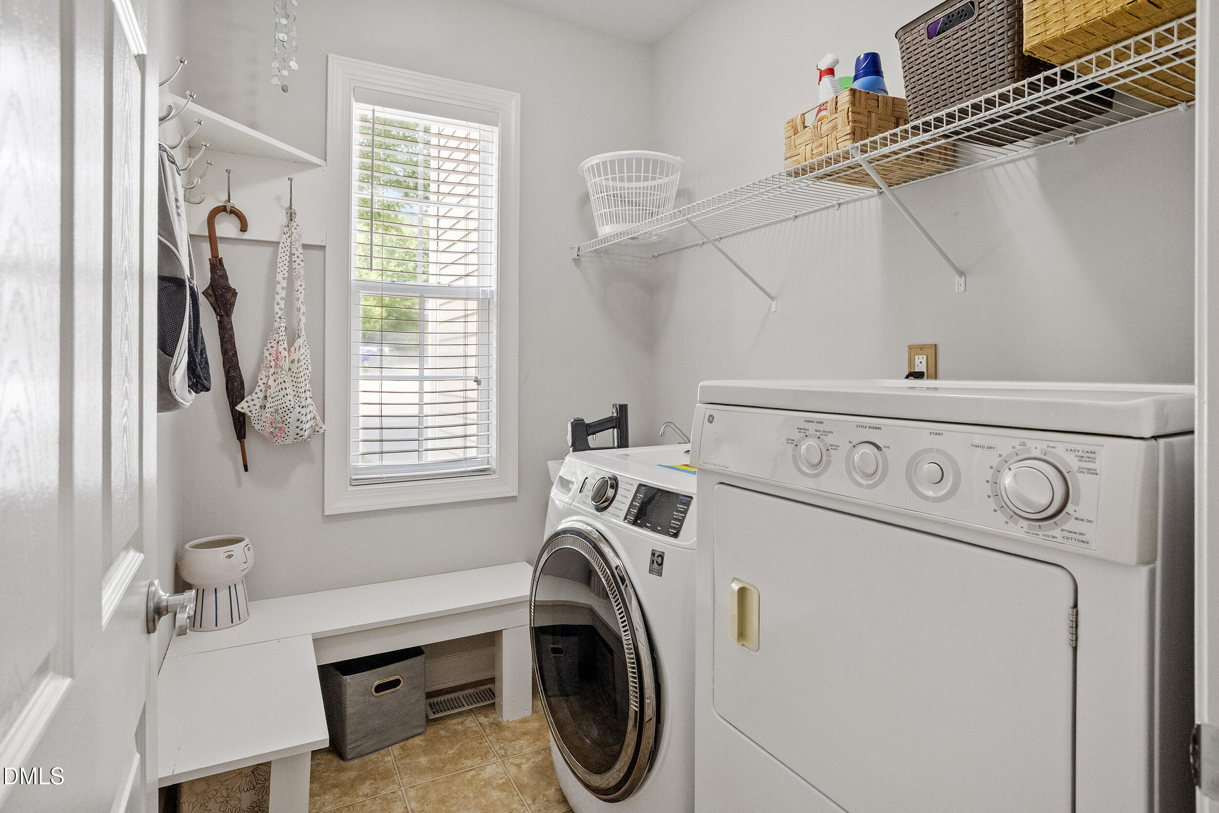 1019 Bianco Drive Raleigh, NC 27607 - Photo 16 of 29 a utility room with dryer and washer