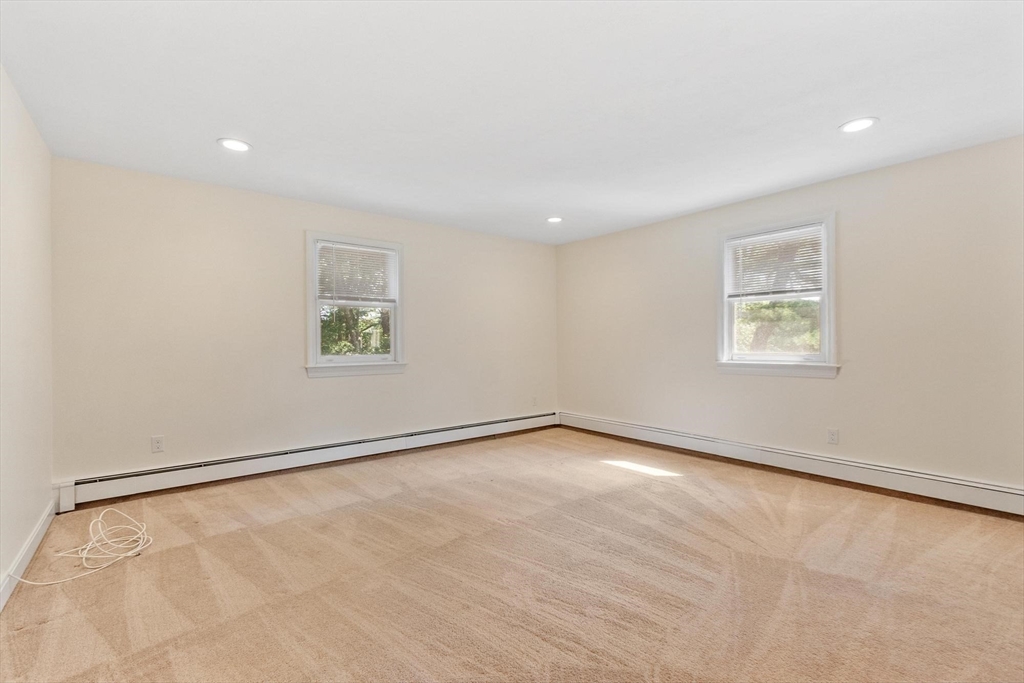 420 Great Road, Unit C1 Acton, MA 01720 - Photo 14 of 29 an empty room with a window
