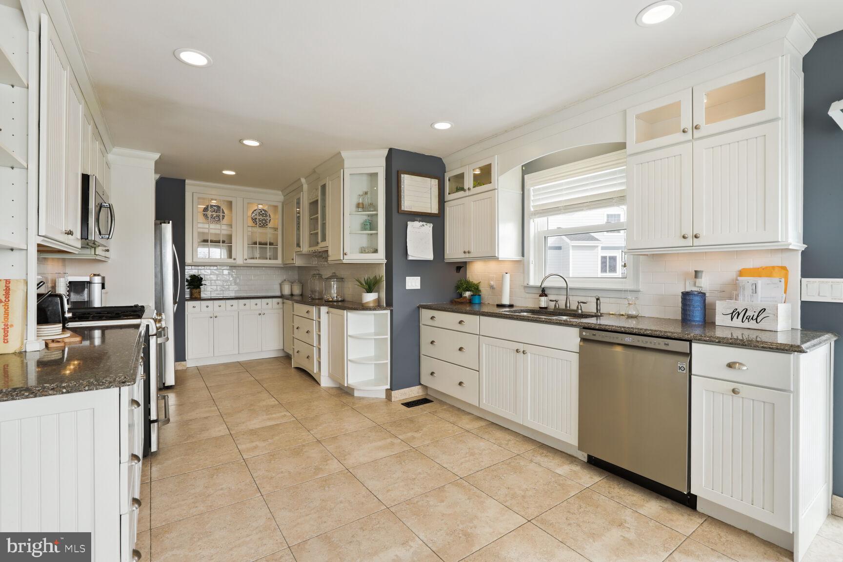 29 Walkill Road Tuckerton, NJ 08087 - Photo 11 of 35 a kitchen with cabinets and chairs