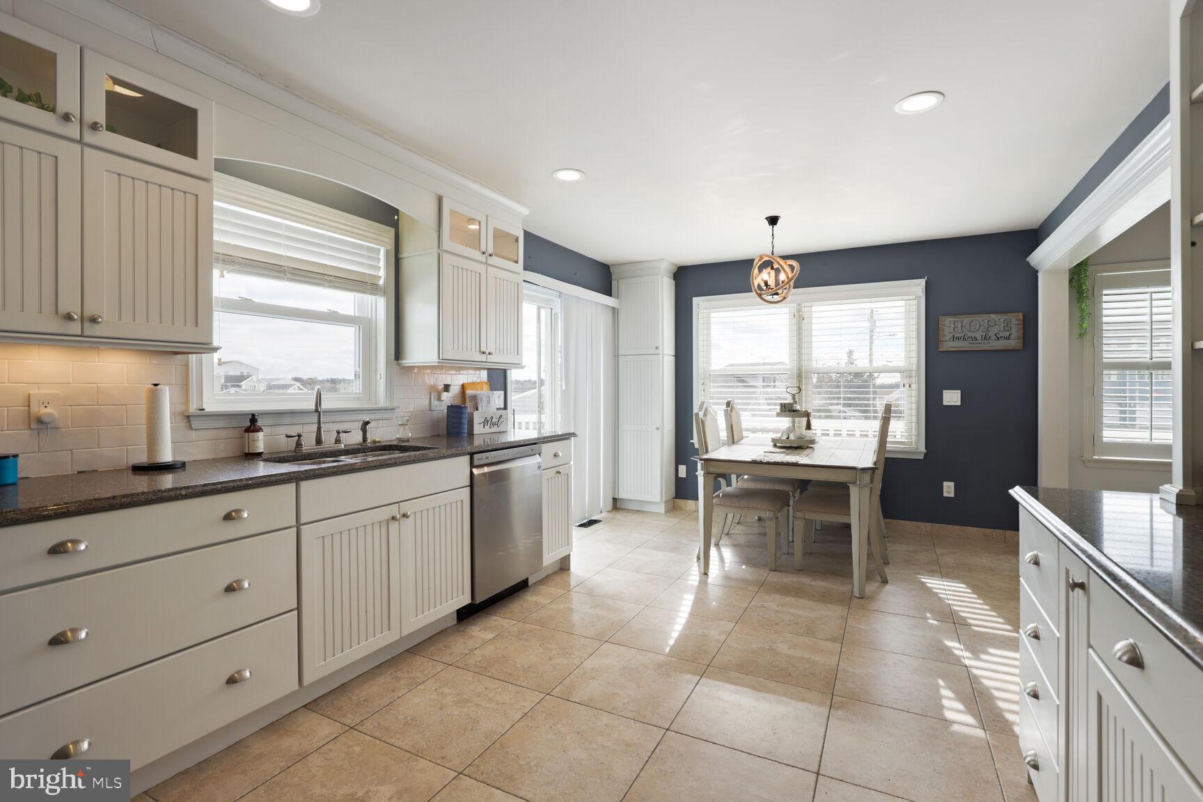 29 Walkill Road Tuckerton, NJ 08087 - Photo 12 of 35 a kitchen with granite countertop a sink and cabinets