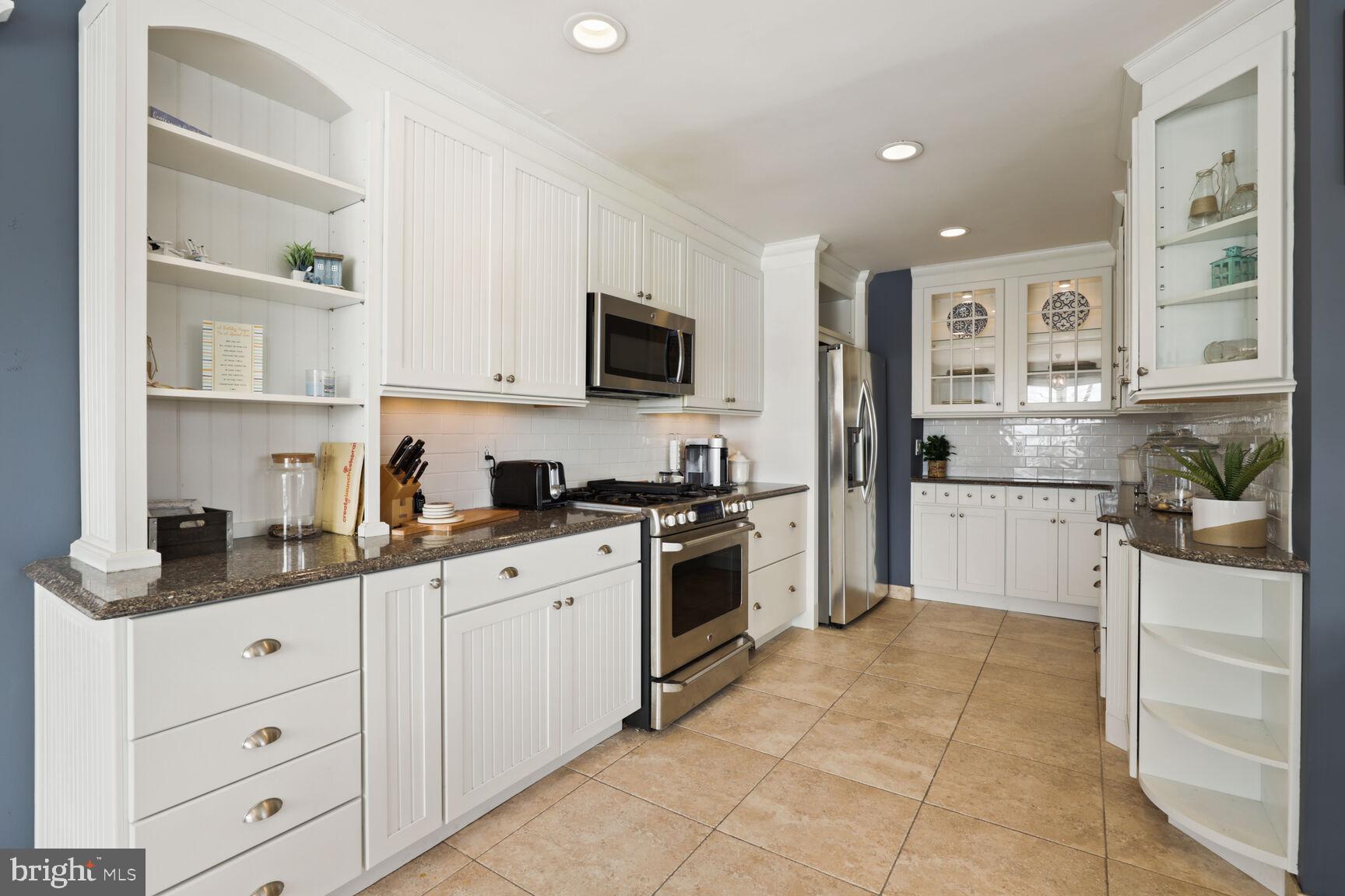 29 Walkill Road Tuckerton, NJ 08087 - Photo 14 of 35 a kitchen with granite countertop cabinets and steel stainless steel appliances