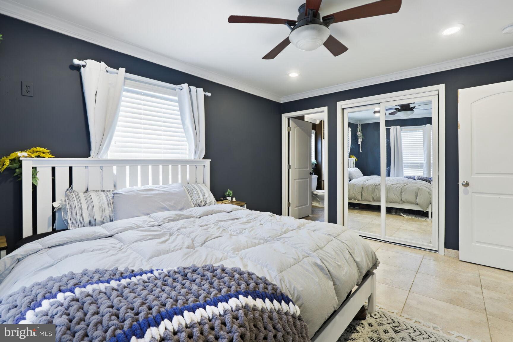 29 Walkill Road Tuckerton, NJ 08087 - Photo 19 of 35 a bedroom with a large bed and a large window