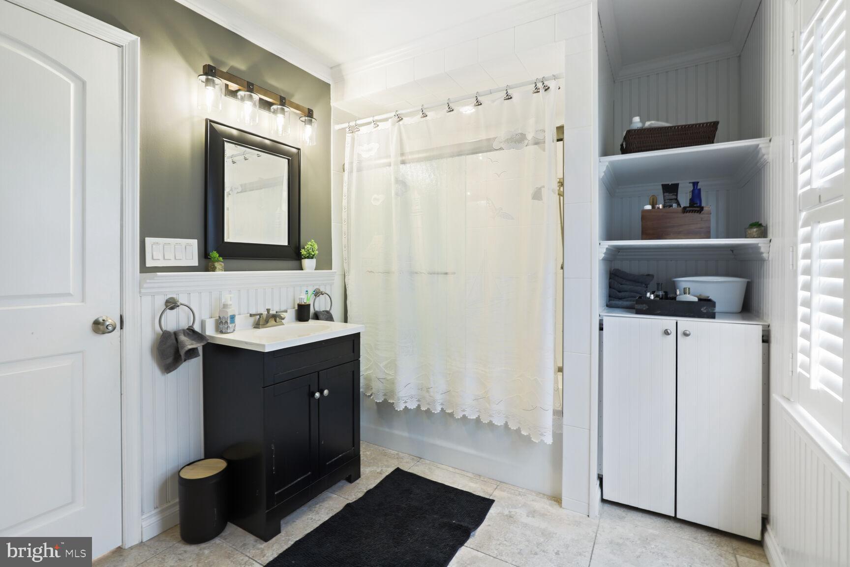 29 Walkill Road Tuckerton, NJ 08087 - Photo 21 of 35 a bathroom with a granite countertop sink a toilet and shower
