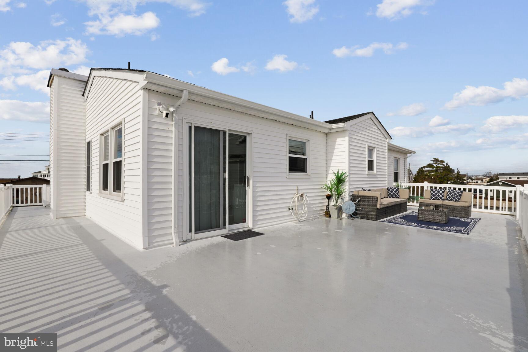 29 Walkill Road Tuckerton, NJ 08087 - Photo 30 of 35 a view of a house with a patio and a yard