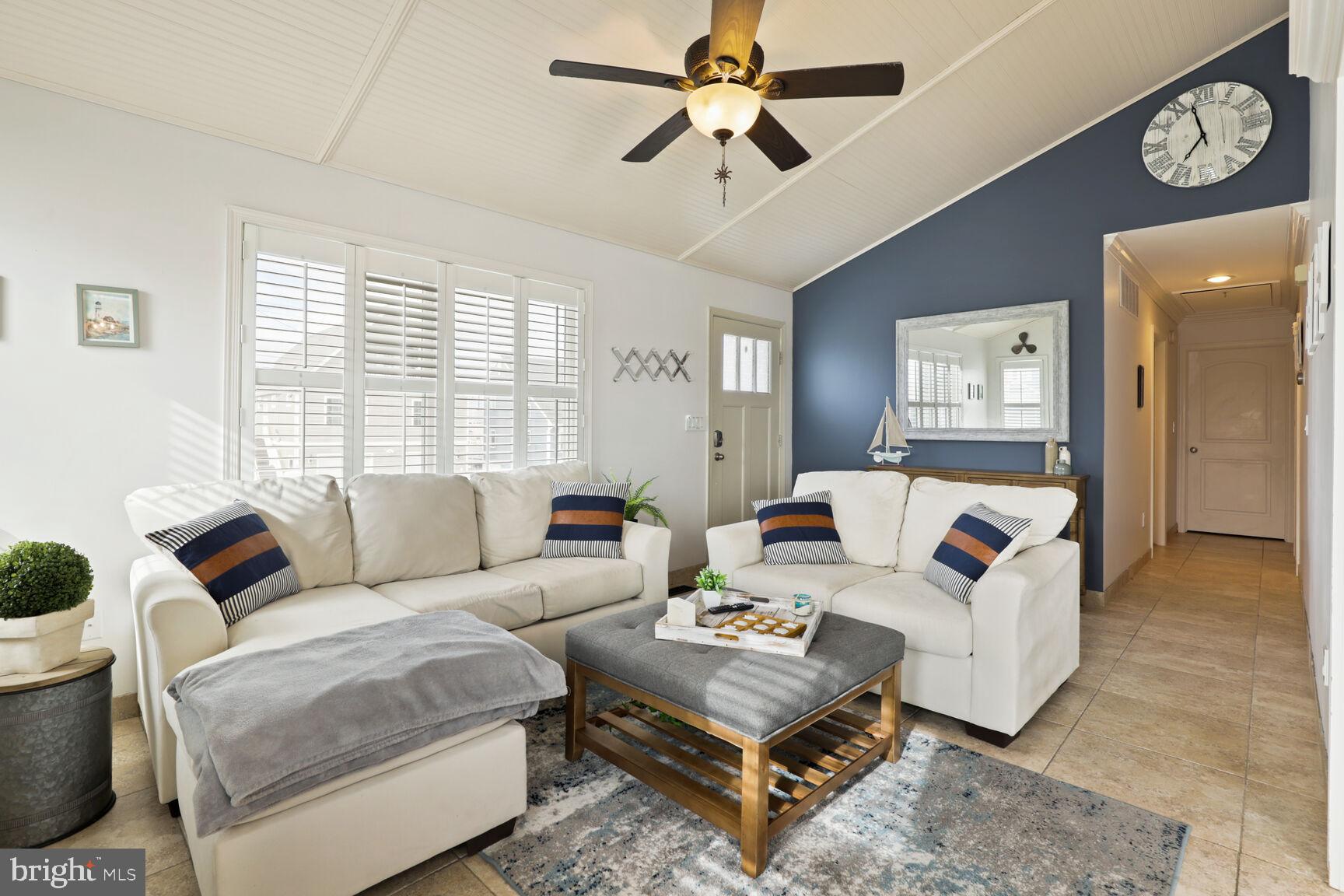 29 Walkill Road Tuckerton, NJ 08087 - Photo 8 of 35 a living room with furniture ceiling fan and a window
