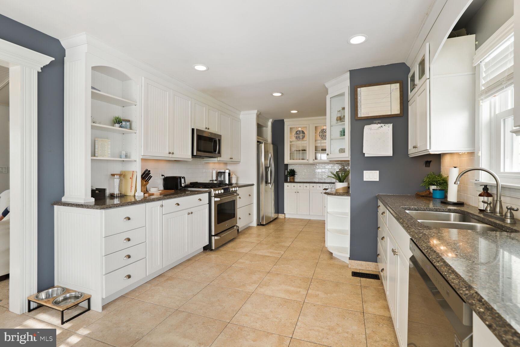29 Walkill Road Tuckerton, NJ 08087 - Photo 9 of 35 a kitchen with granite countertop a sink a counter top space stainless steel appliances and cabinets