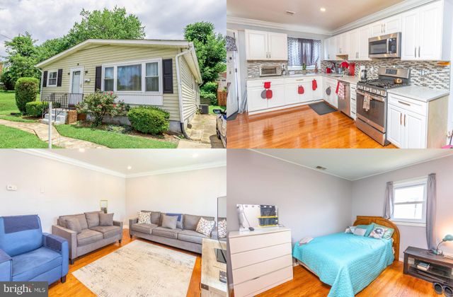 a kitchen with a refrigerator and a stove top oven