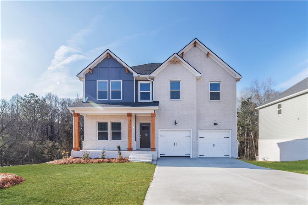 288 Overlook Road Covington, GA 30014 - Photo 1 of 1 a front view of house with yard and green space