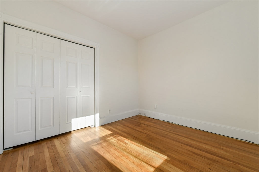 50 Mt Vernon Street, Unit 3 Boston, MA 02125 - Photo 12 of 16 a view of a room with wooden floor