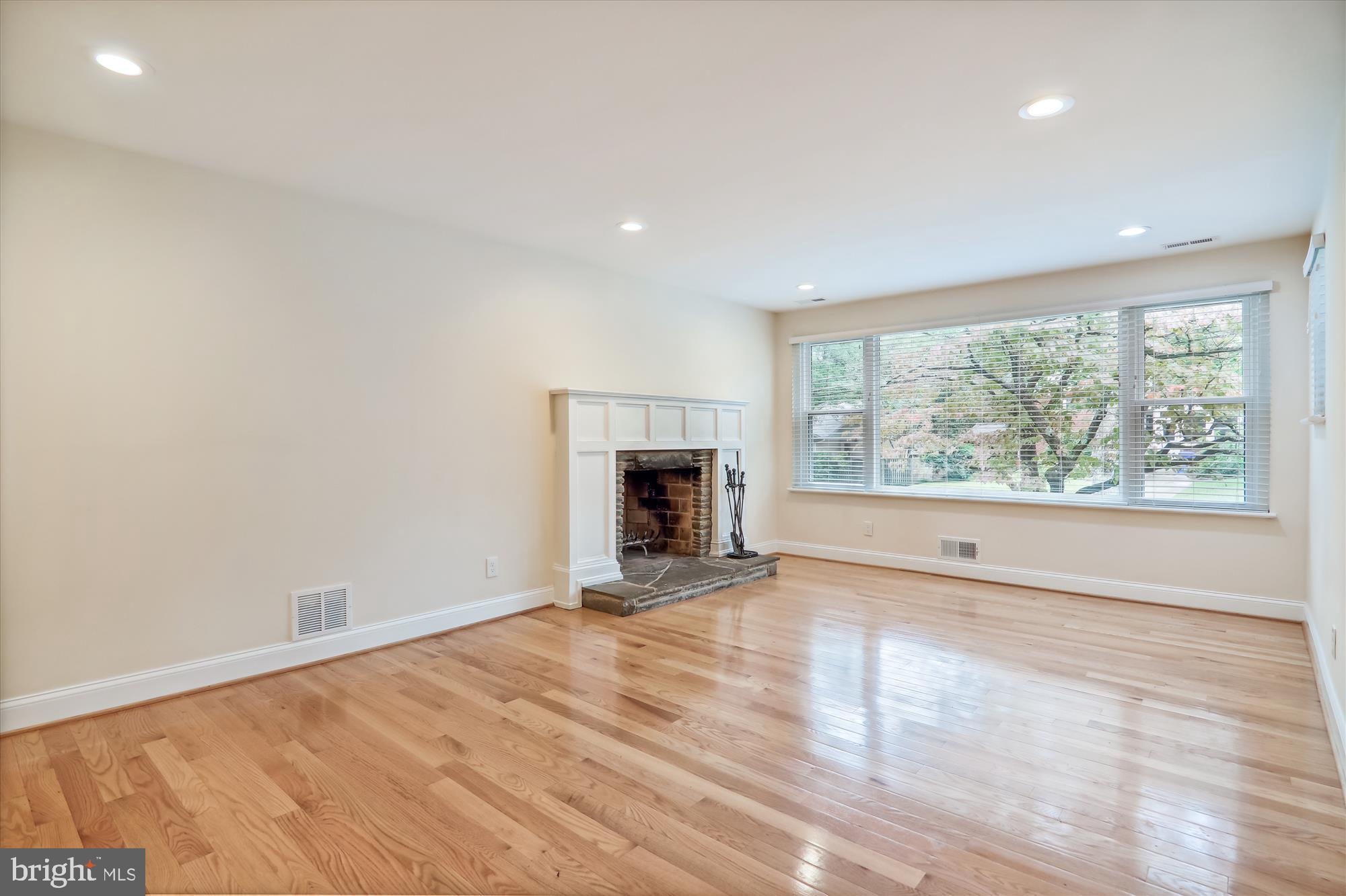 9105 Levelle Drive Chevy Chase, MD 20815 - Photo 8 of 56 Living Room with stone fireplace
