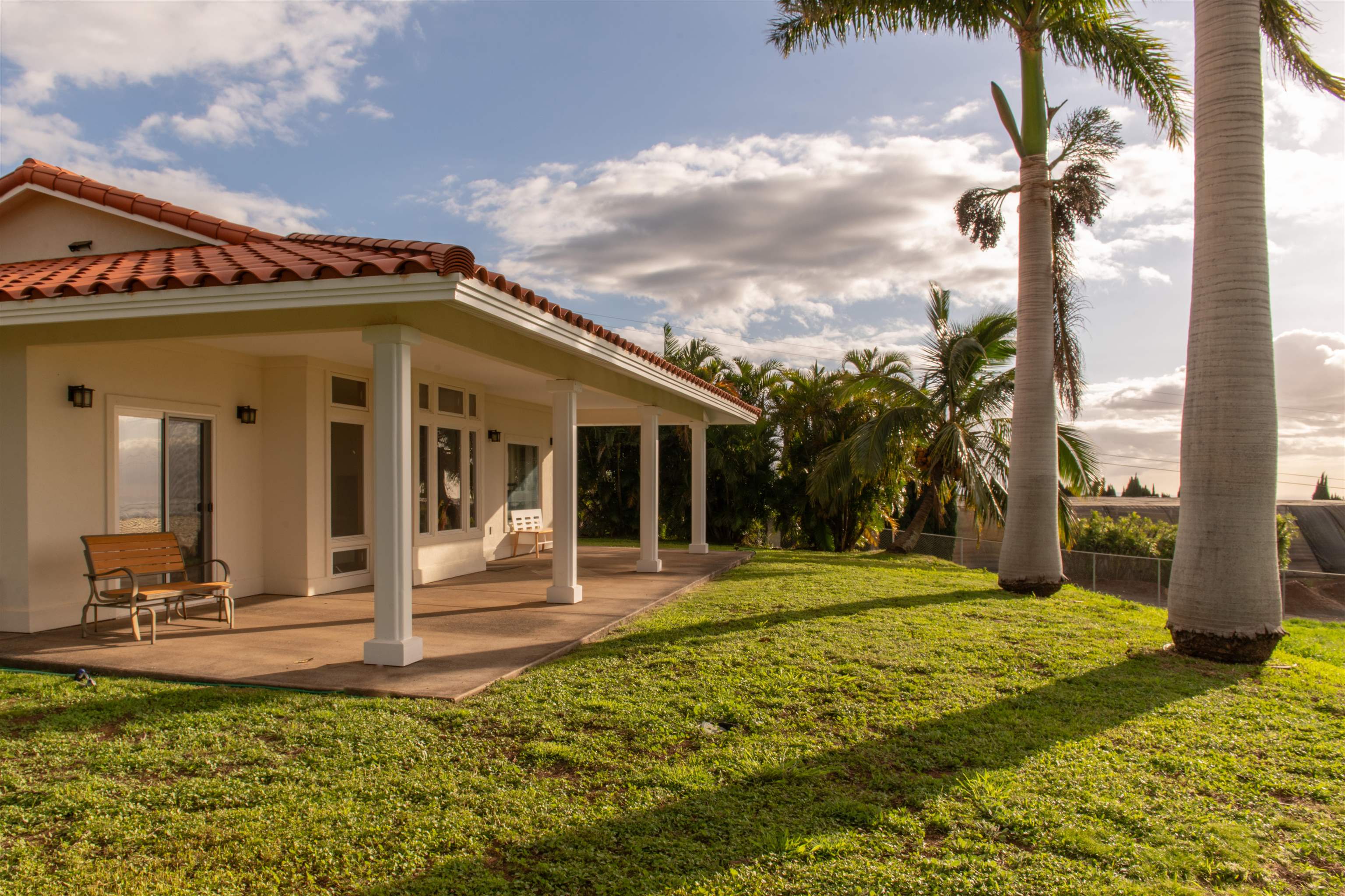 2345 Omaopio Road Kula, HI 96790 - Photo 19 of 23 a front view of a house with garden