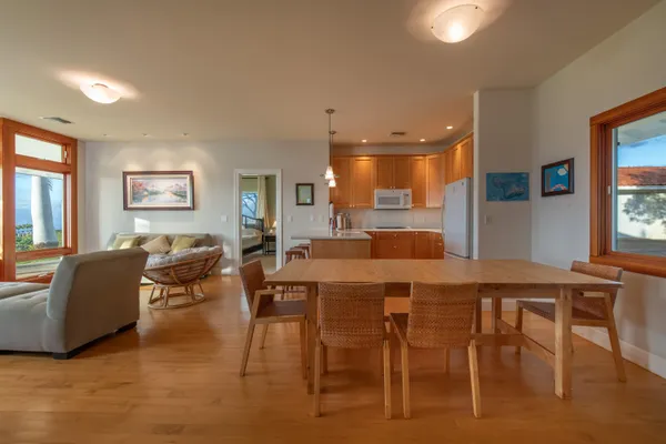 a view of a dining room with furniture